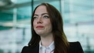 Emma Stone before her dramatic transformation in Bugonia, seen with her natural hair before shaving her head for the role. (Image via YouTube/Focus Features)